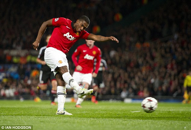 Master blaster: Antonio Valencia hammers the ball into the net for United's fourth goal of the night
