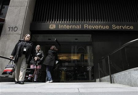 Women walk out of an Internal Revenue Service office in New York April 18, 2011. REUTERS/Lucas Jackson