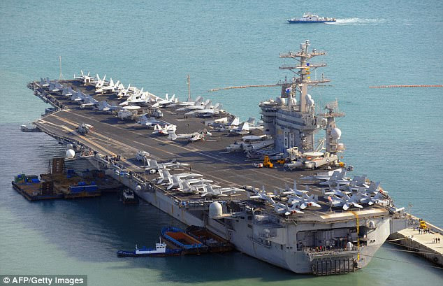 Sunday night an Iranian QOM-1 drone fly within 1,000 feet (300 meters) of aircraft based on the USS Nimitz aircraft carrier (pictured in a file photo) while operating in international waters