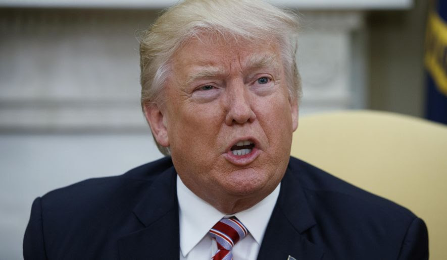 President Donald Trump talks to reporters during a meeting with Dr. Henry Kissinger, former Secretary of State and National Security Advisor under President Richard Nixon, in the Oval Office of the White House, Wednesday, May 10, 2017, in Washington. (AP Photo/Evan Vucci)