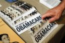 File photo of an Obamacare pamphlet at a Tea Party rally in Littleton
