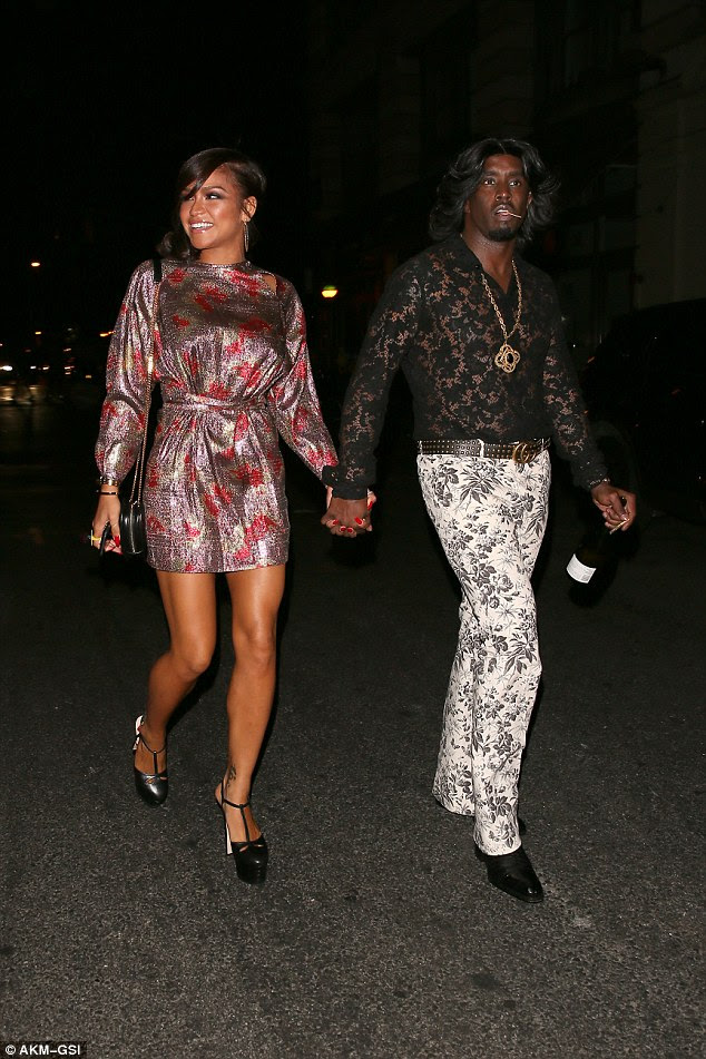 Stylish arrival: Sean Diddy Combs arrived holding hands with Cassie