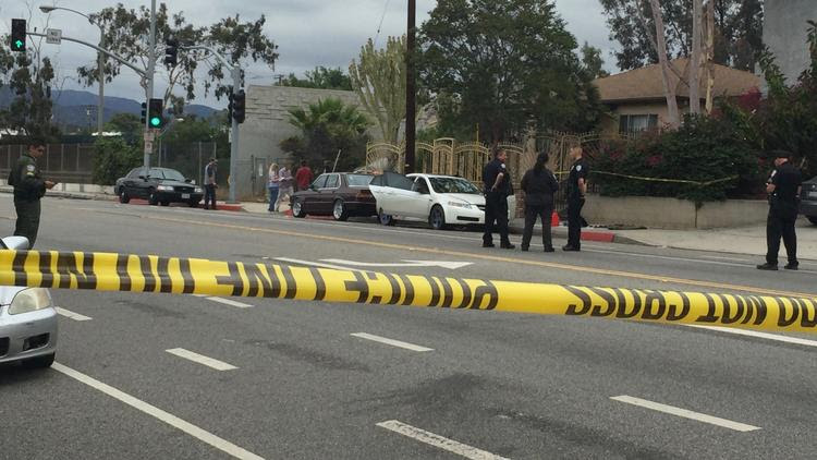 Police surround Acura in Santa Monica