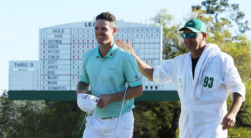 Justin Rose and caddie