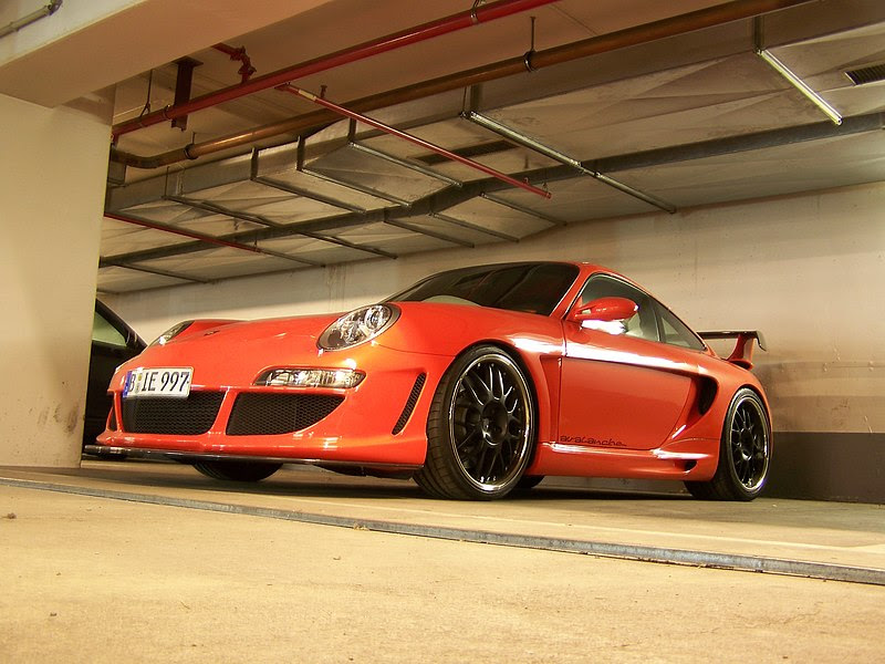 File:Orange Gemballa Avalanche (Porsche 997) with black rims in the Kempinski Hotel Kurfuerstendamm underground parking garage.jpg