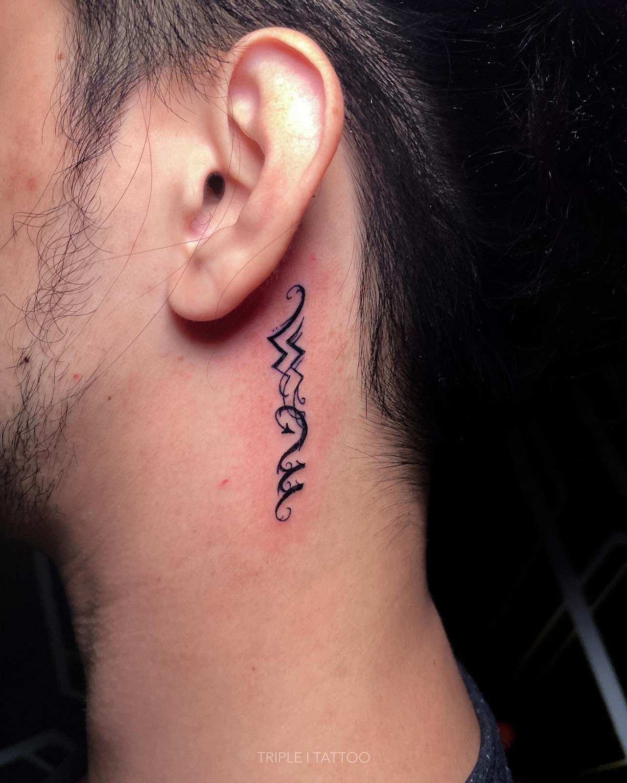Zodiac Behind The Ear Tattoo