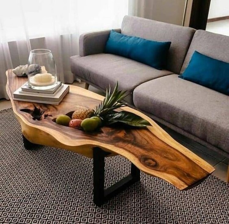 Một chút nhấn nhá đầy ngẫu hứng cho phòng khách với bàn trà từ gỗ me tây và ghế sofa