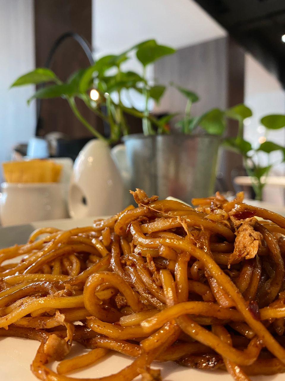 A picture containing food, chow mein, indoor, fries

Description automatically generated