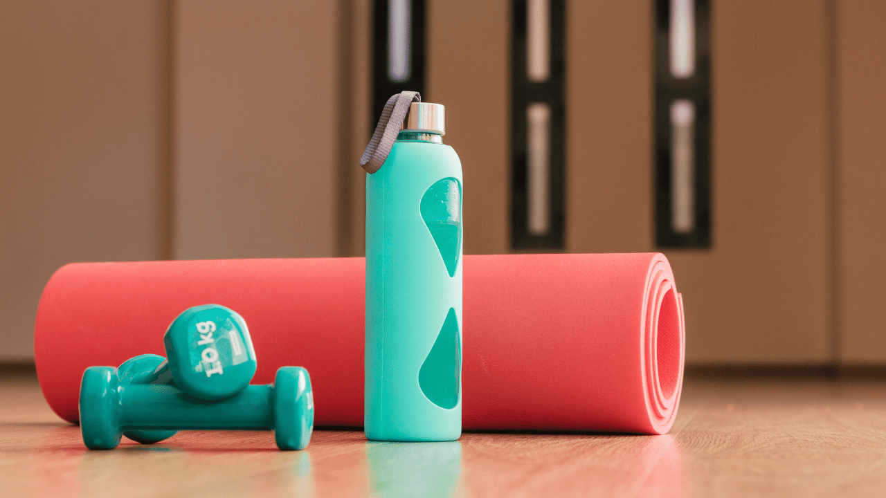 Dumbbells and a yoga mat.
How to Stay Fit Forever: 25 Expert Tips To Improve Your Workout, Fitness, and Health