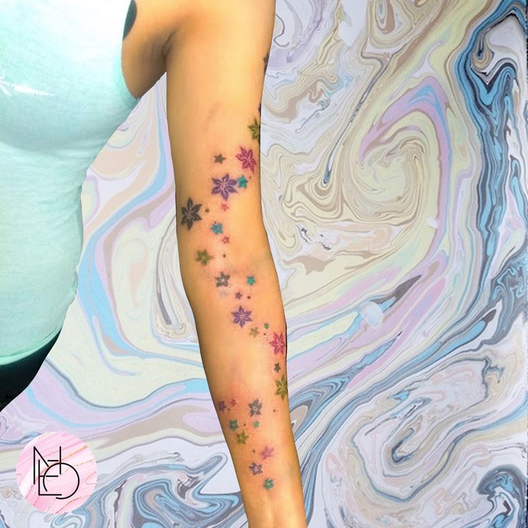 Colorful Stars Trail Tattoo On Wrist