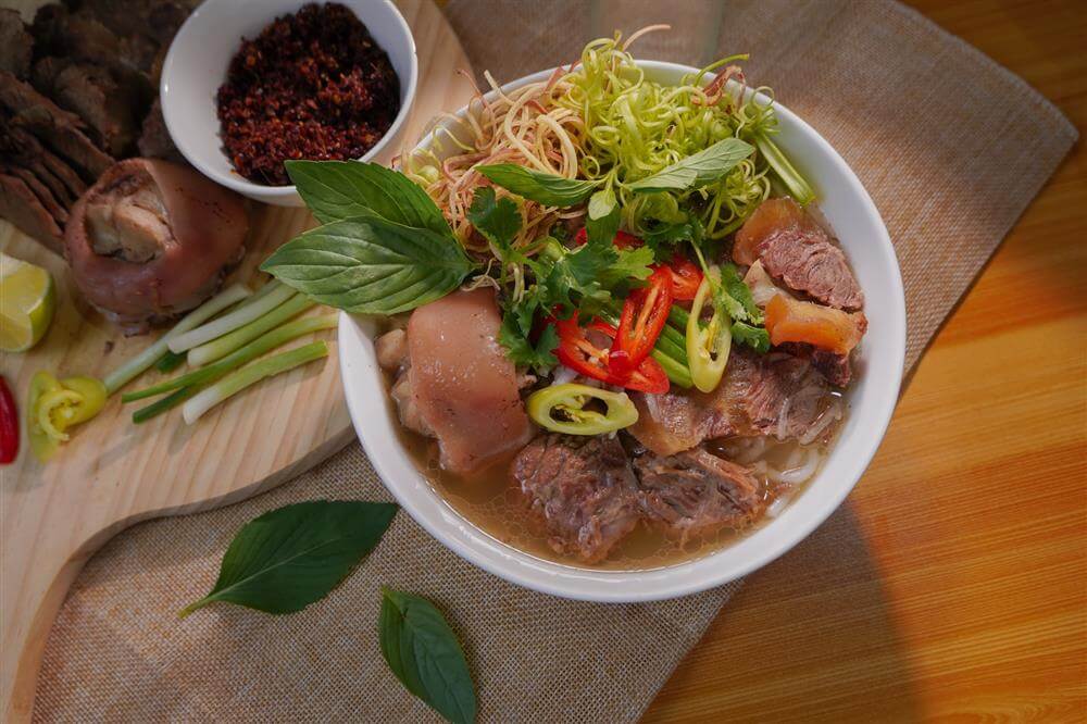 Bun bo Hue is a must-try if you want some spicy stuff on rainy days. Photo by Unsplash Vy Huynh