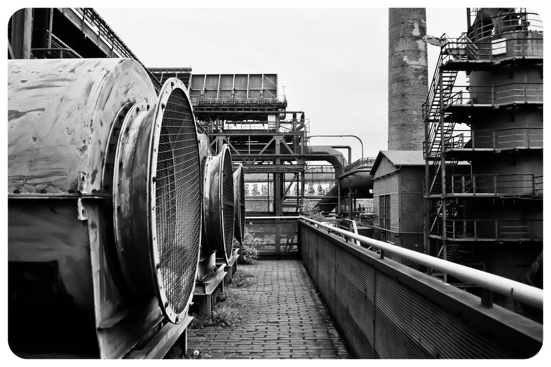 Gray Scale Photography of Industrial Machine