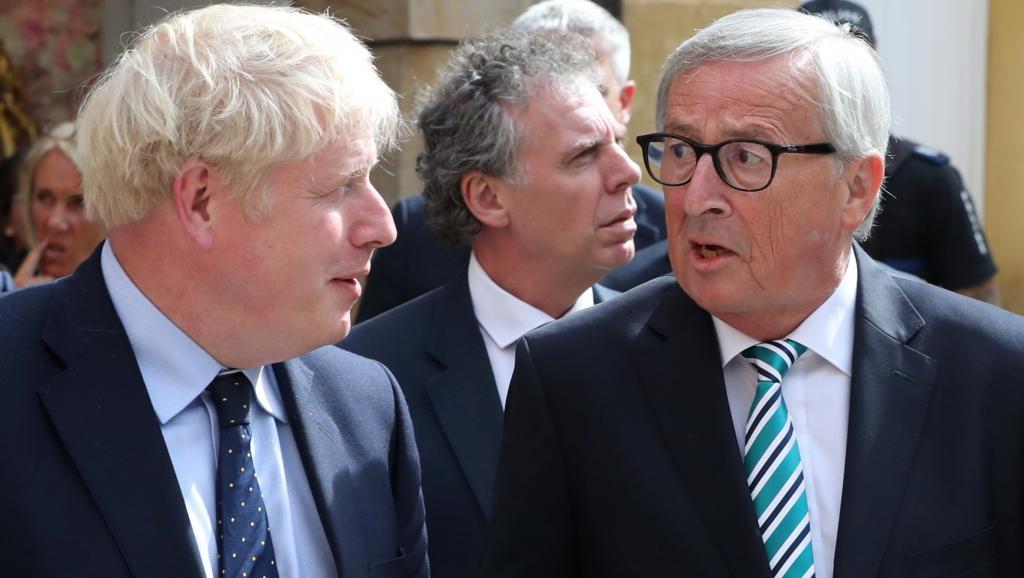 欧盟委员会主席容克与英国首相约翰逊。