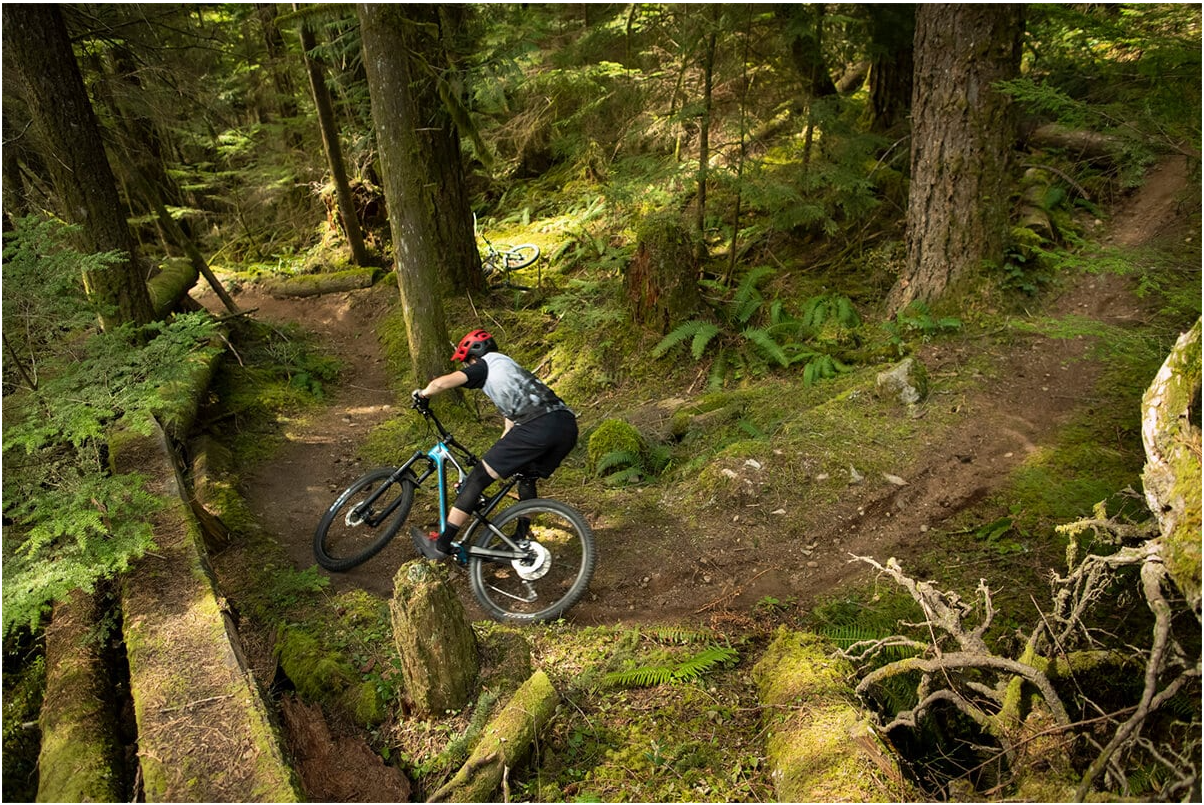 The extra width of a wide mountain bike handlebar can make turning feel cumbersome and slow.