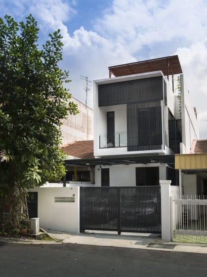 Narrow facade modern two-story house