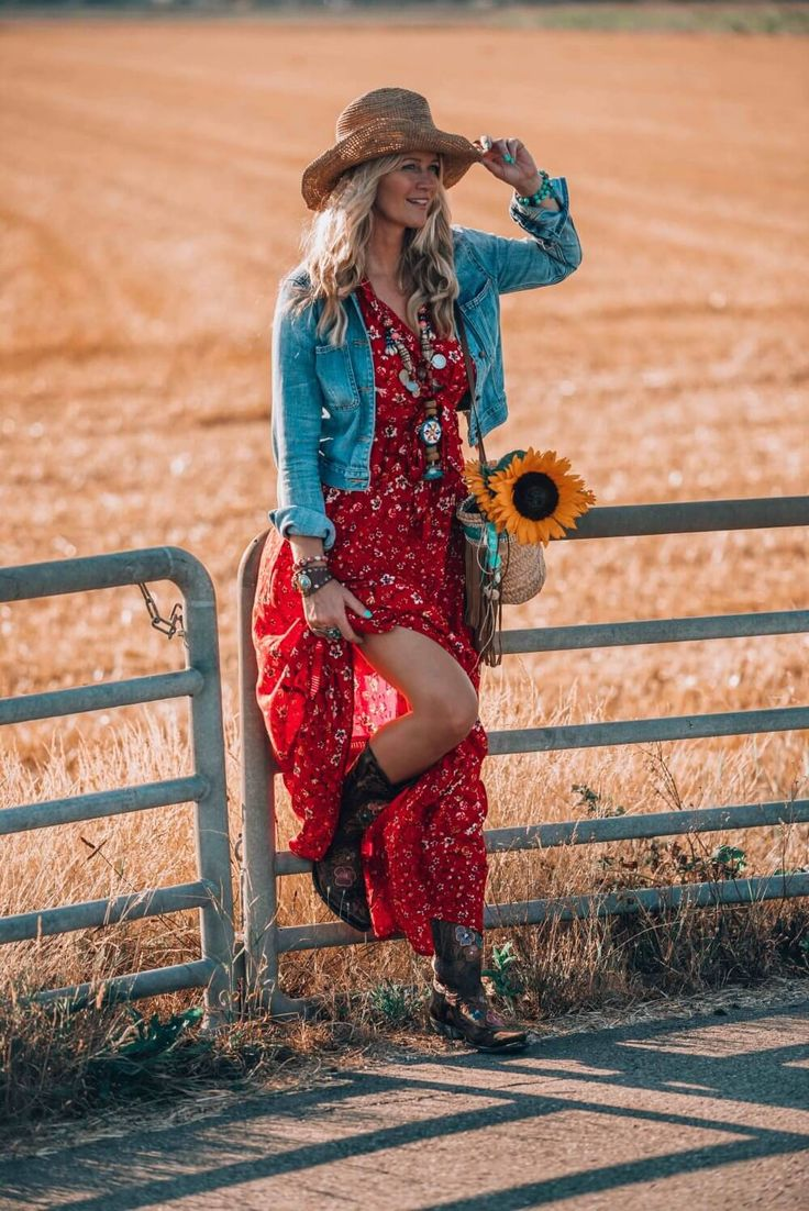 Woman in bohemian outfit and hat in denim jacket