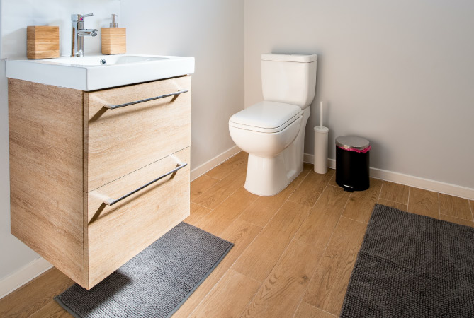 A small bathroom stocked with essentials