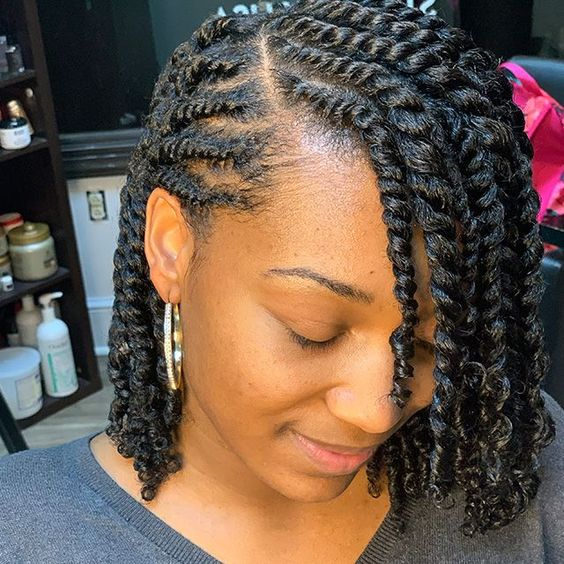 a lady wearing bounce twists for styling natural short hair