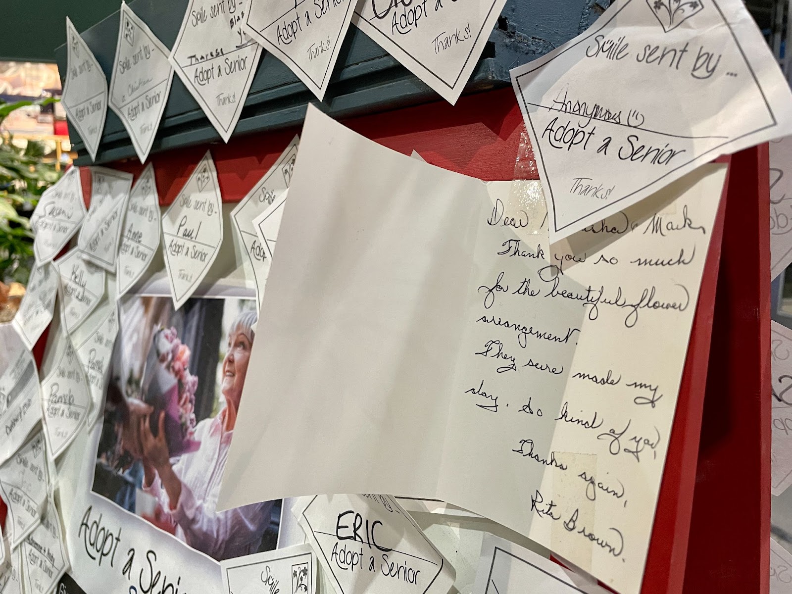 The board of customer notes and thank-you cards from seniors at Forget Me Not flower shop