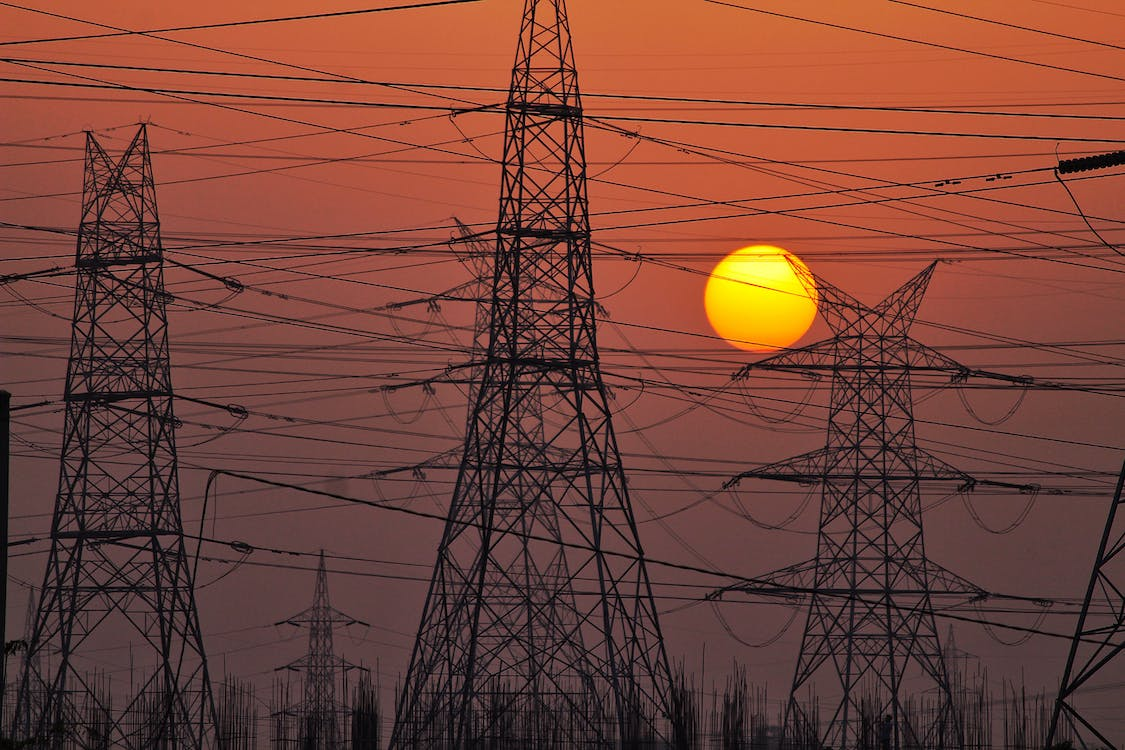 Power Lines Against Sunset
