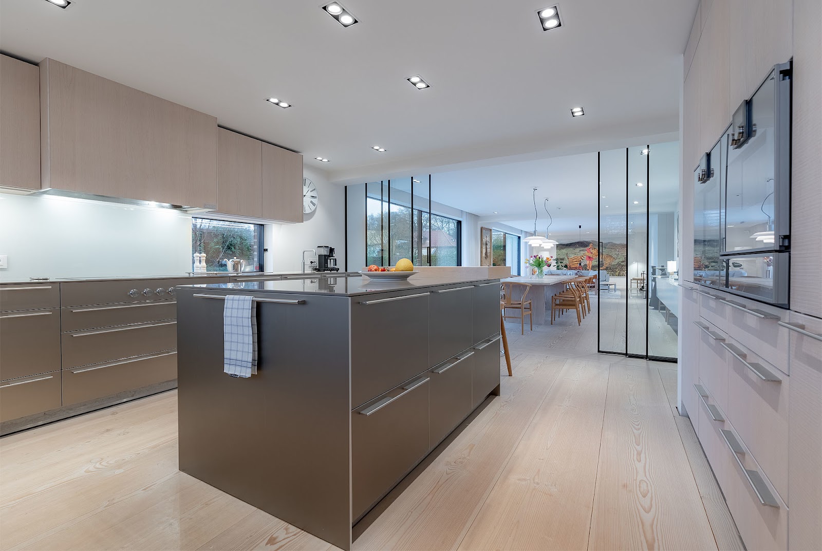 Elegant kitchen with grey facades and Kitchen Island