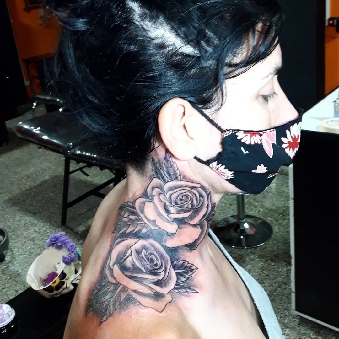 Stunning Gray Roses Tattoo