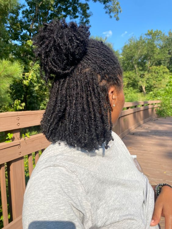 Backview of  a lady rocking her locs