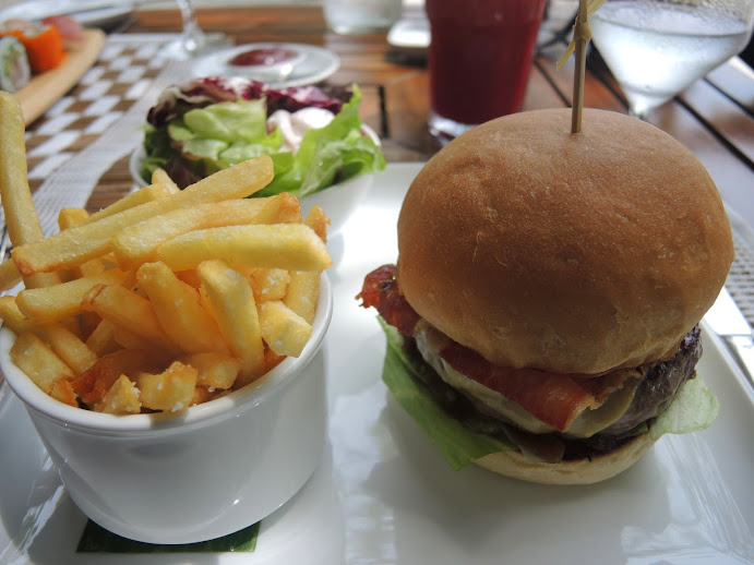 a burger and fries on a plate