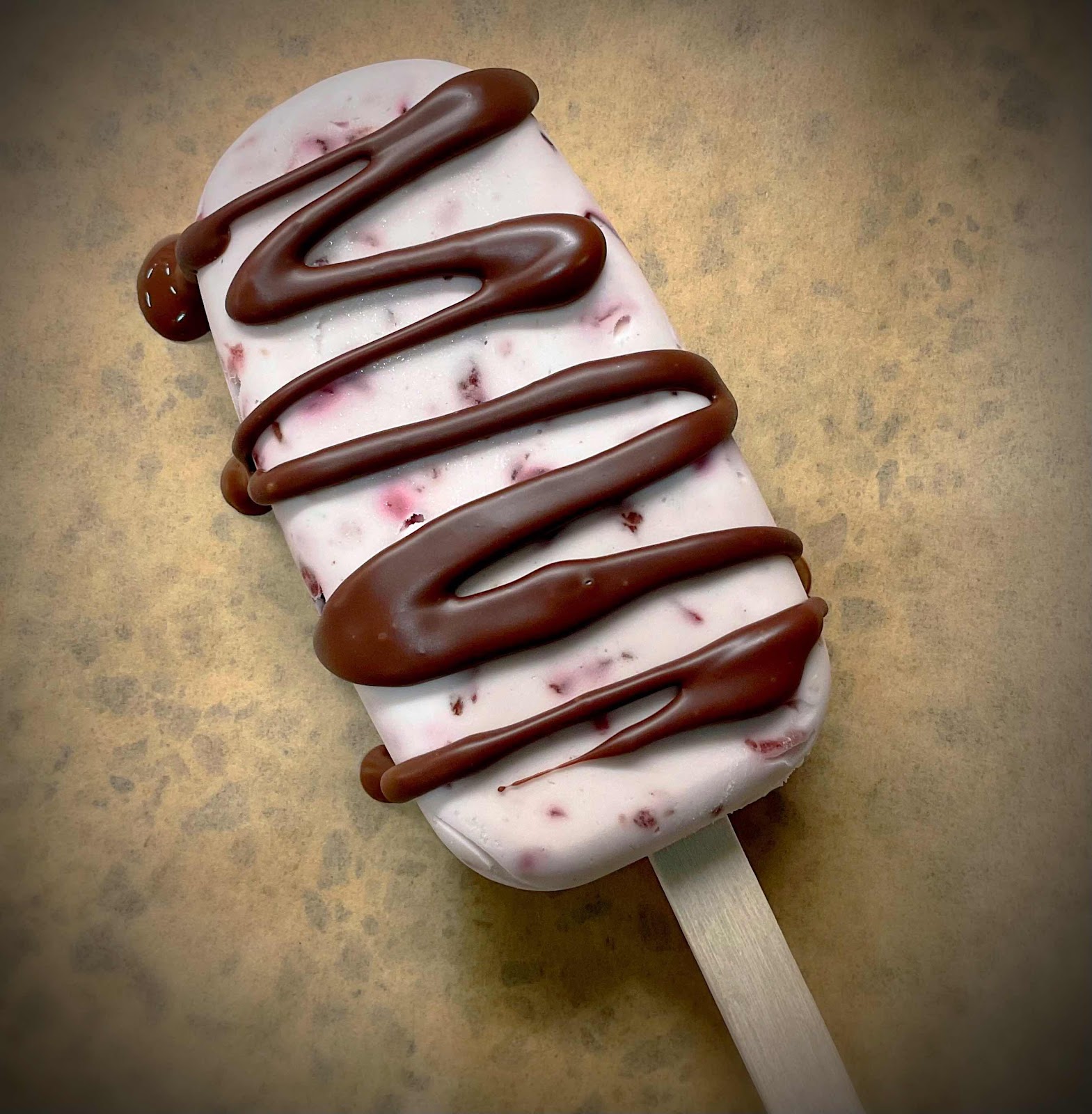 Chocolate Covered Cherry Cheesecake Popsicles