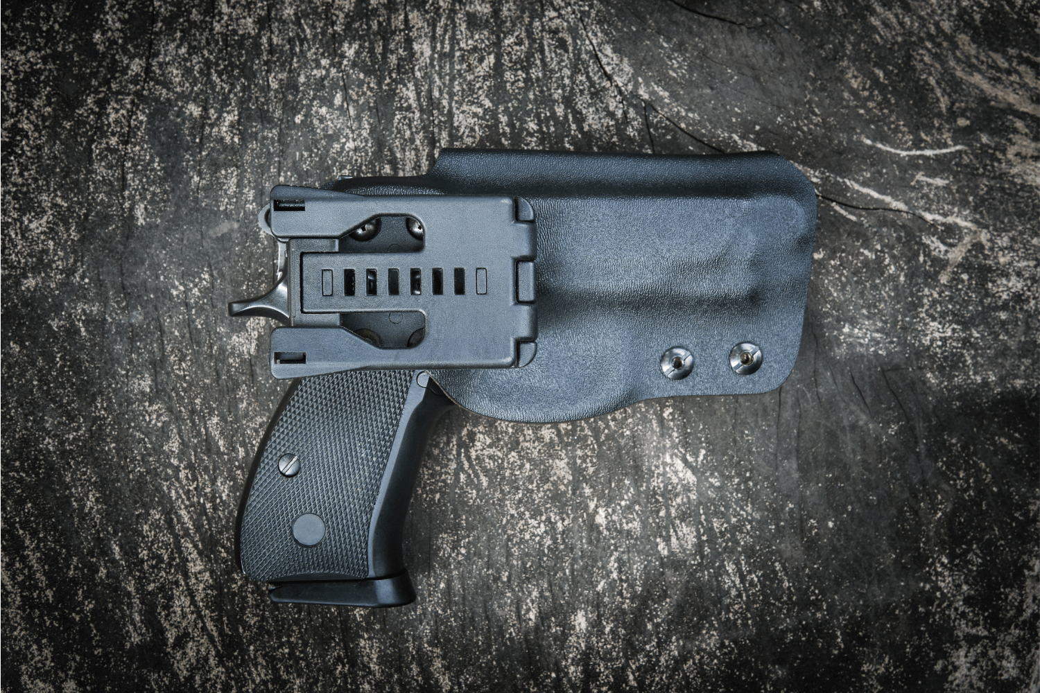 Firearm in a black holster
