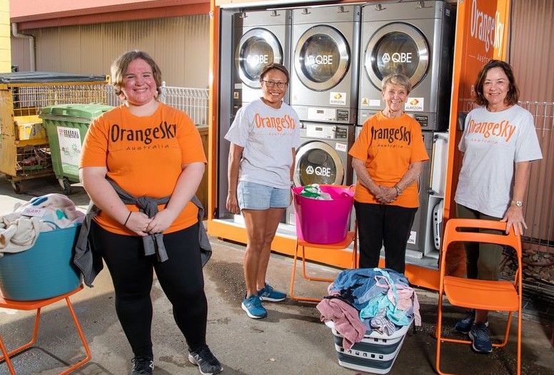 Orange Sky volunteers provide laundry services and showers to homeless people
