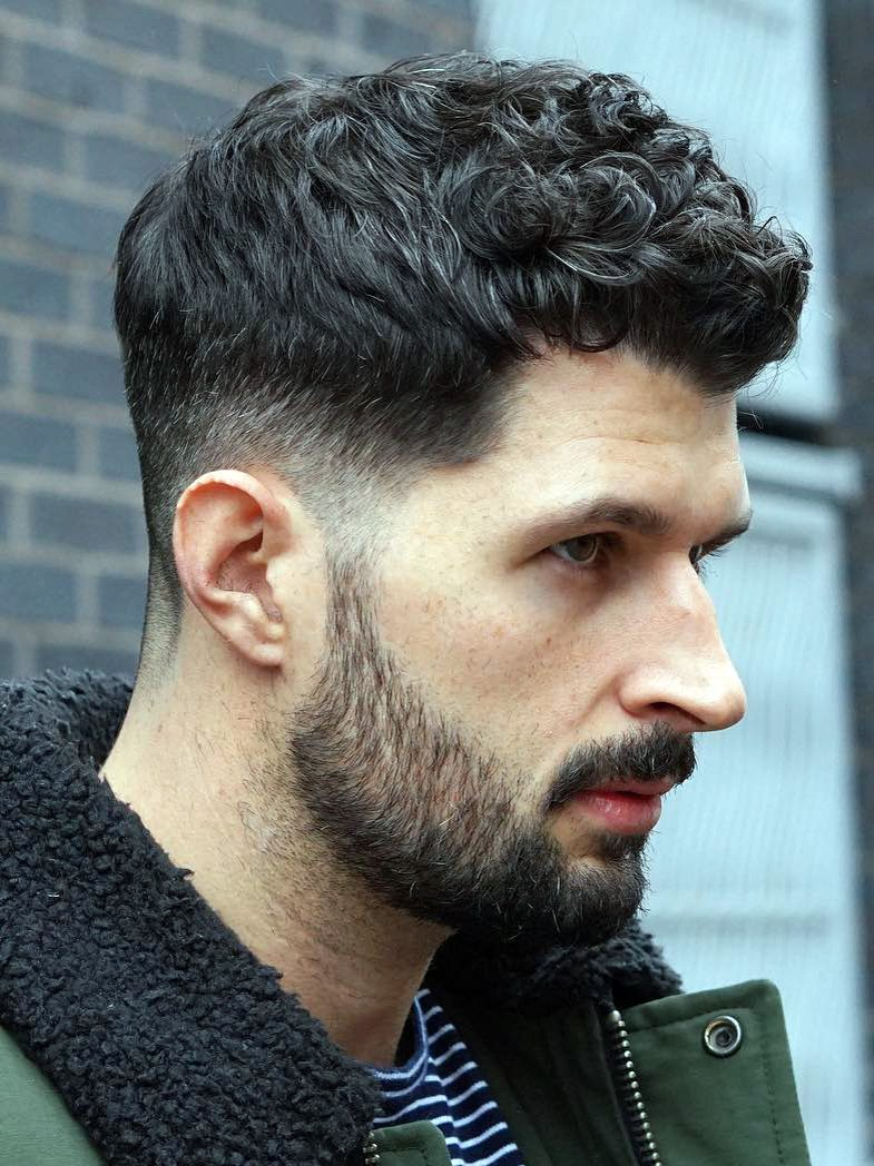man with beard rocking fade with short hair