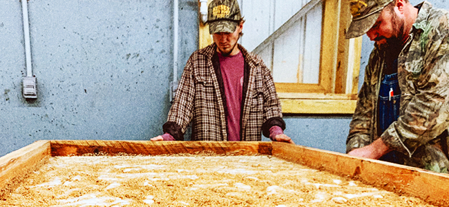 Two Men Working At Twin Creeks Distillery