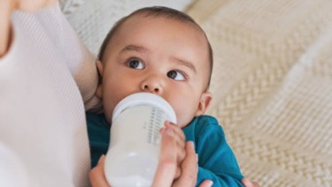 Infant drinking milk