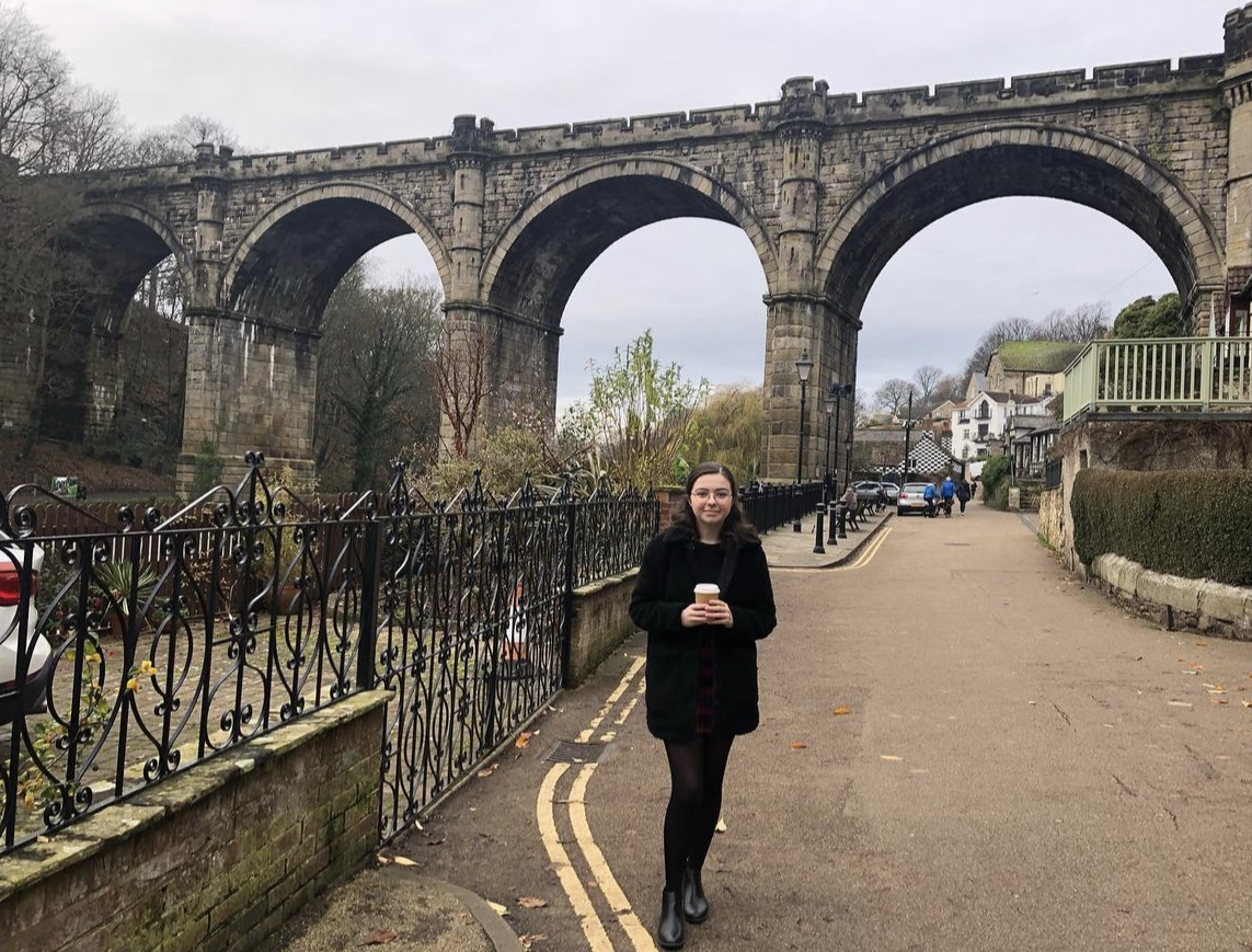 Me standing on a road with the Knaresborough viaduct in the background.