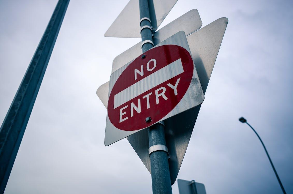 Free White and Red No Entry Road Sign Stock Photo