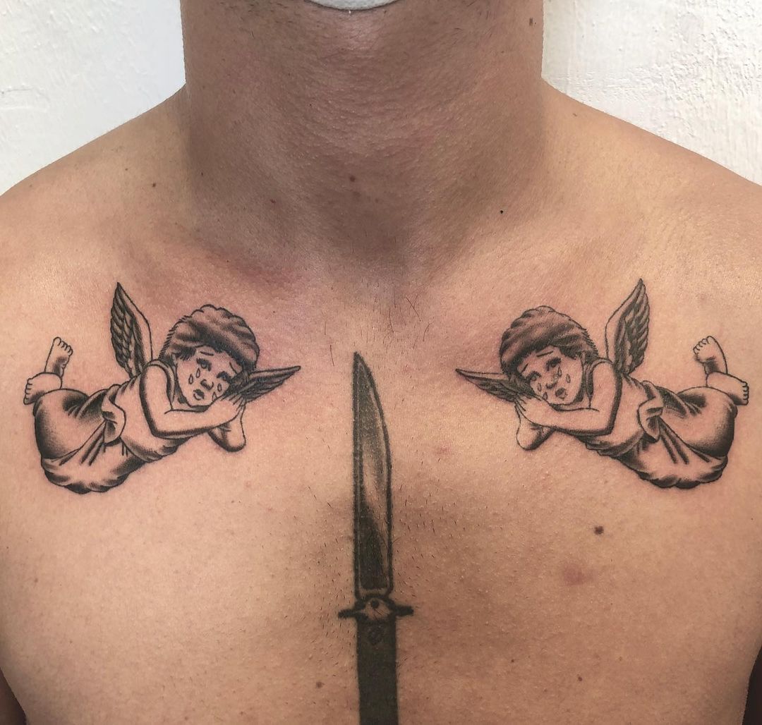 Crying Angel With Dagger Tattoos On Chest