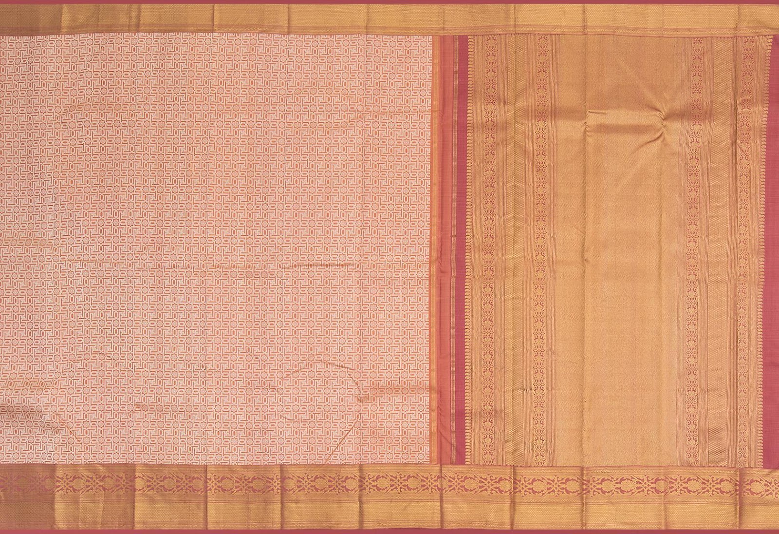 This naturally-dyed Kanchipuram silk saree features swastik motifs within a jaal pattern. 