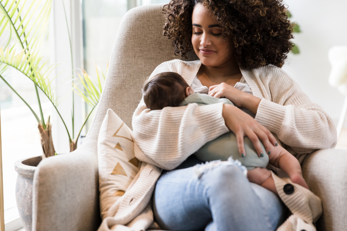 black breastfeeding mother and baby