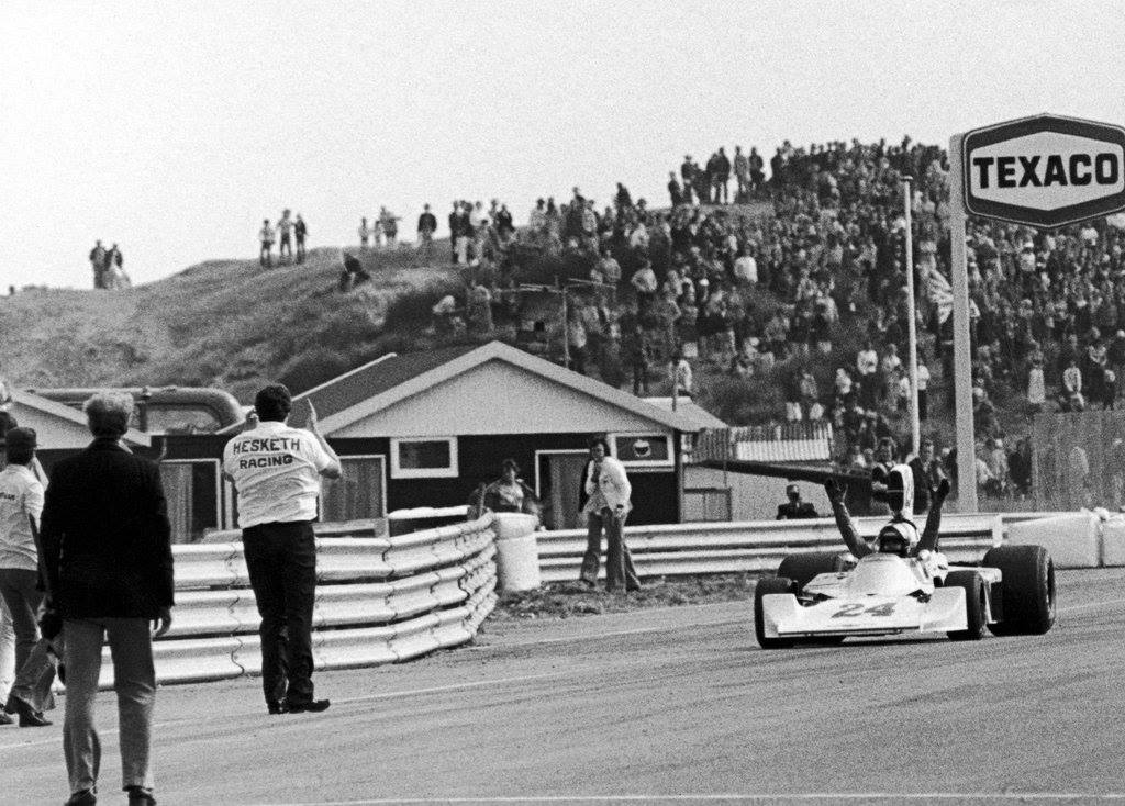 Lord Hesketh applauding a victorious James Hunt at the end of the 1975 Dutch Grand Prix. Credit: unknown.