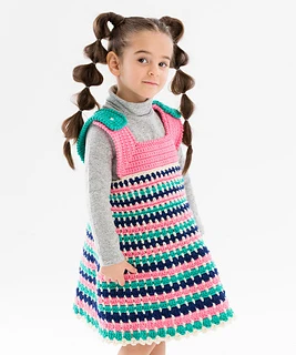 girl wearing a crocheted jumper
