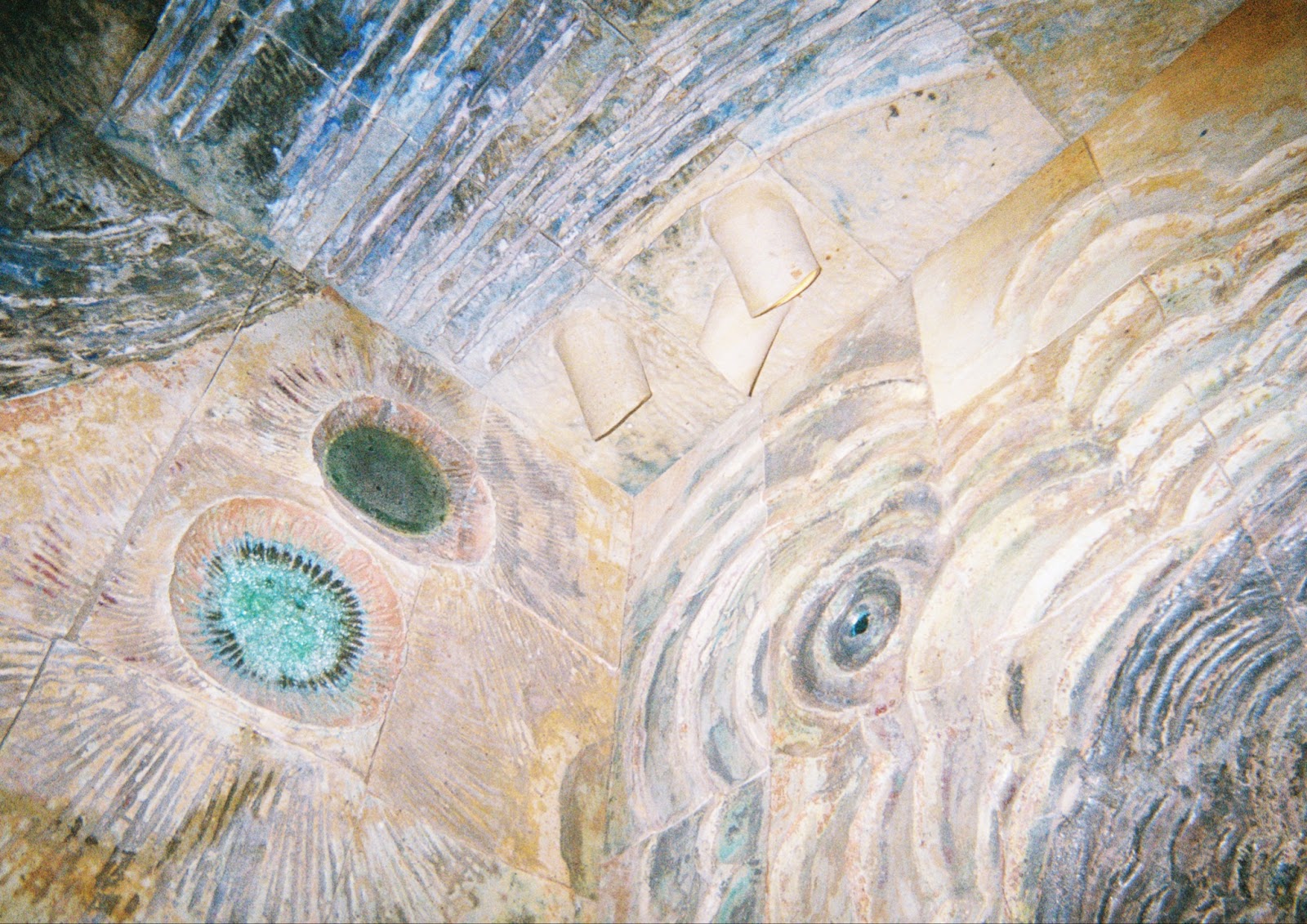 Image: Detail shot of Earth, Water, Sky, 1968. Multiple rings around a right-aligned circle. Courtesy of the artist.