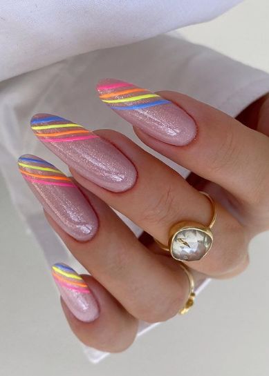 Rainbow nails with bright colors and lines