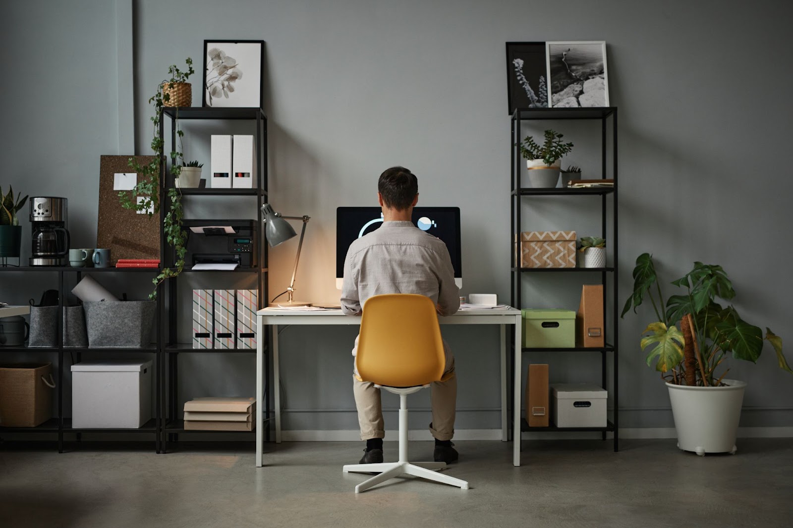 man-using-computer-home-office