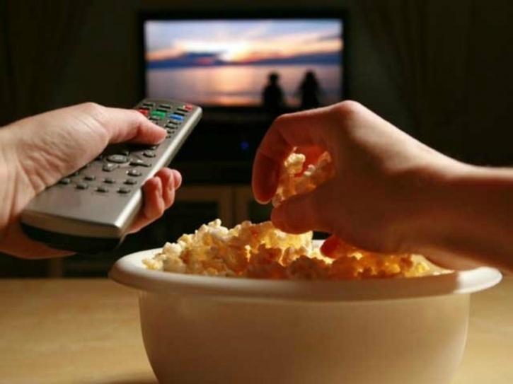 Image result for eat while watch tv