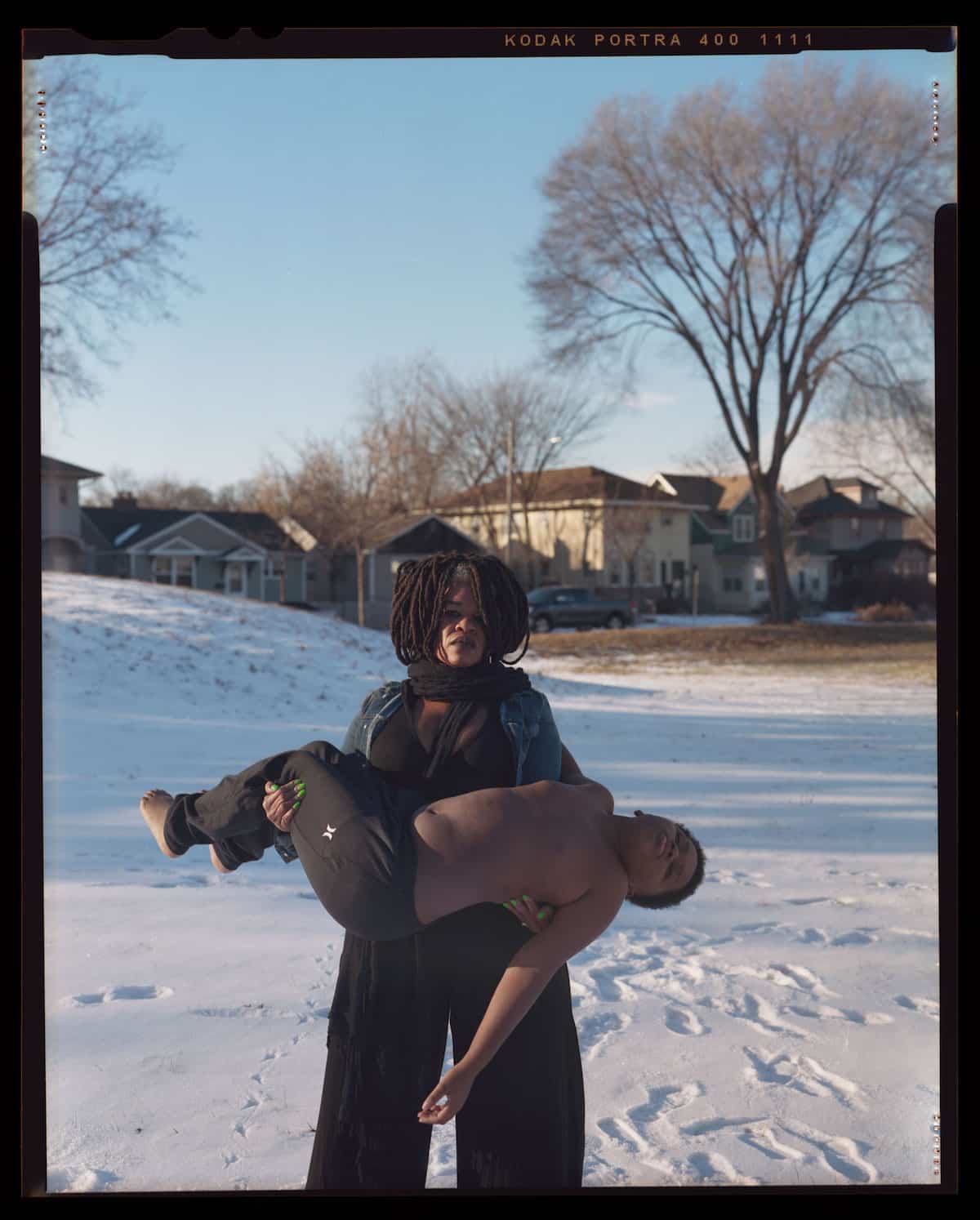 Portrait of Black Mother Cradling Her Dead Son