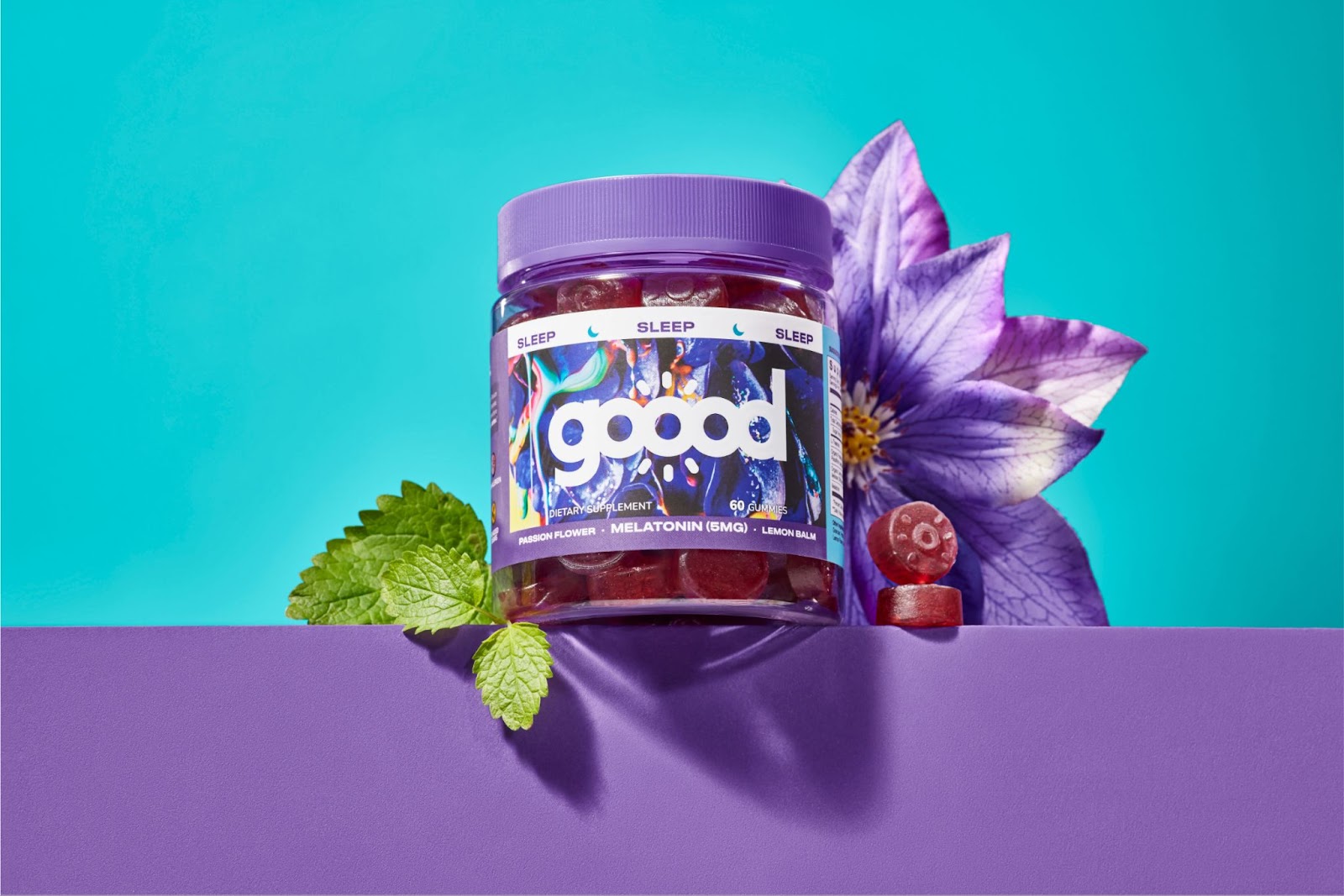 Packaging design for Goood Wellness featuring real flowers, fruits and botanicals dripping with color 