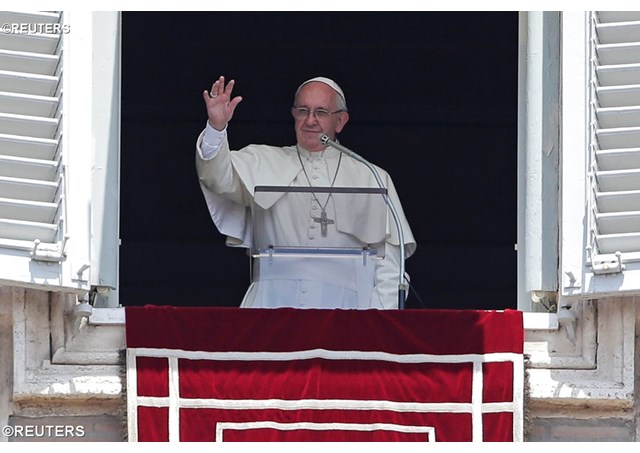 Pope Francis greets pilgrims from around the world during Sunday's Angelus address. - REUTERS