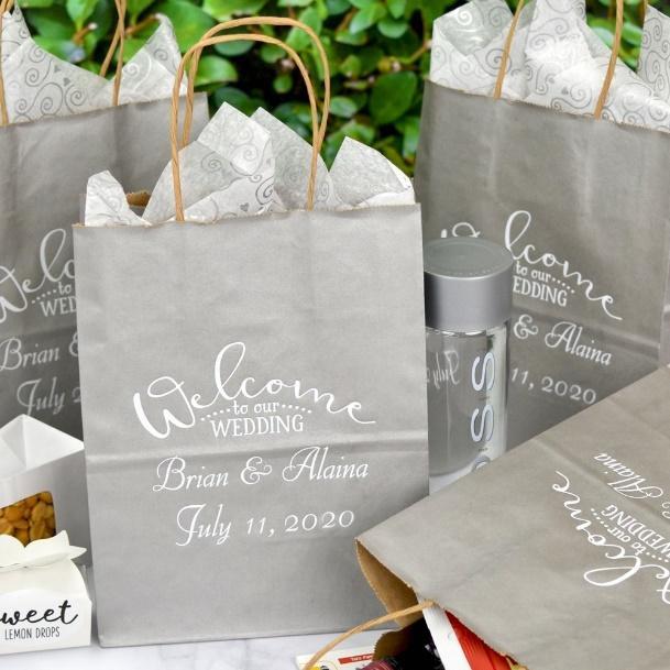 https://myweddingreceptionideas.com/images/products/bags/cub/personalized-8-x-10-silver-paper-welcome-bags-lg.jpg
