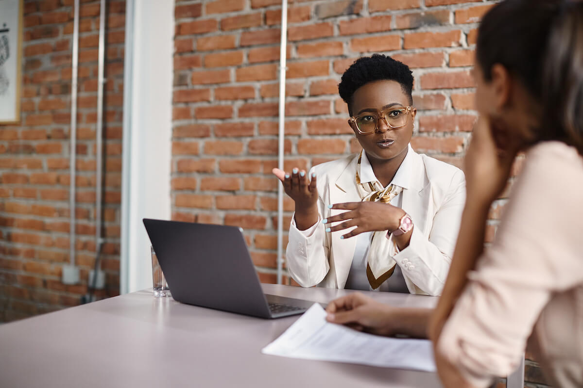 Manager talking to an employee